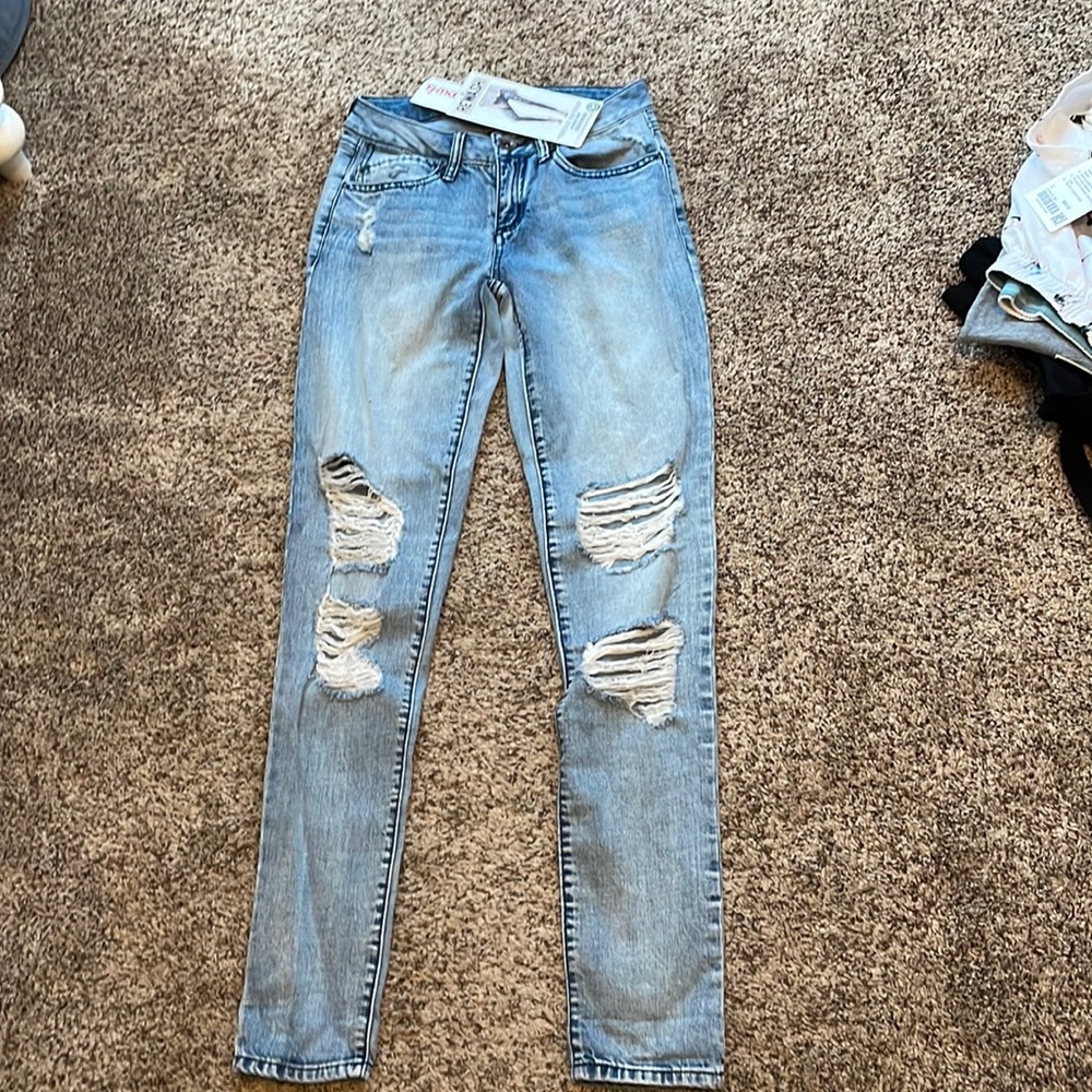 Woman’s Vintage Rewash Classic Rise Distressed Jeans
